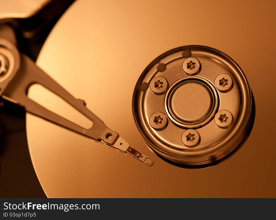 Hard drive platter with needle, up close.