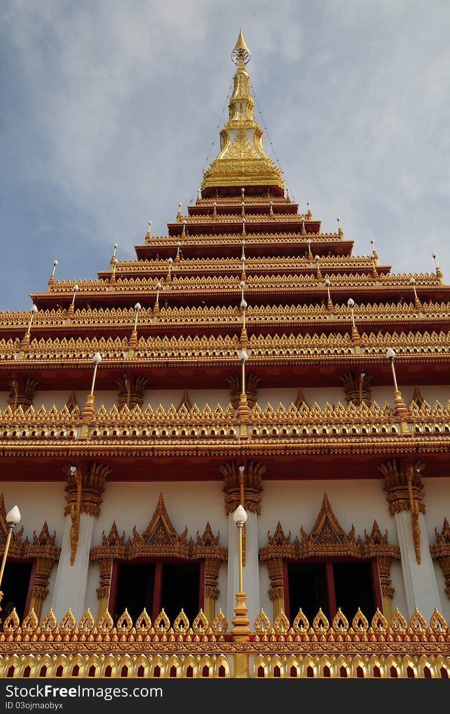 Details of traditional Thai art on base of church.