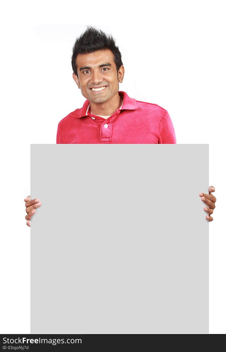 Closeup of a man standing by white blank card