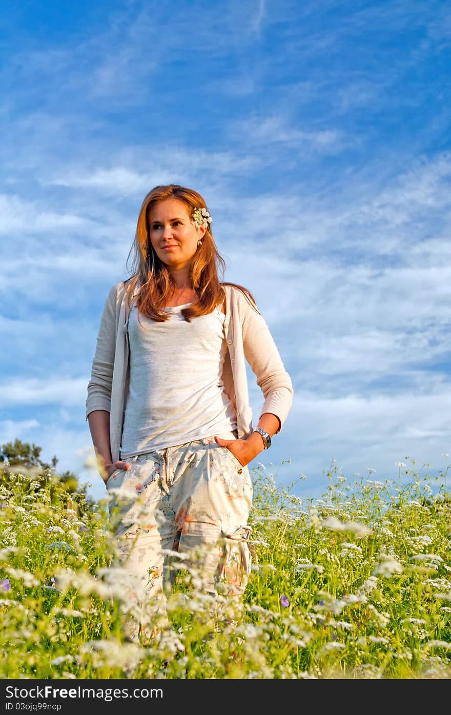 Cute caucasian young woman during the sunset. Cute caucasian young woman during the sunset.