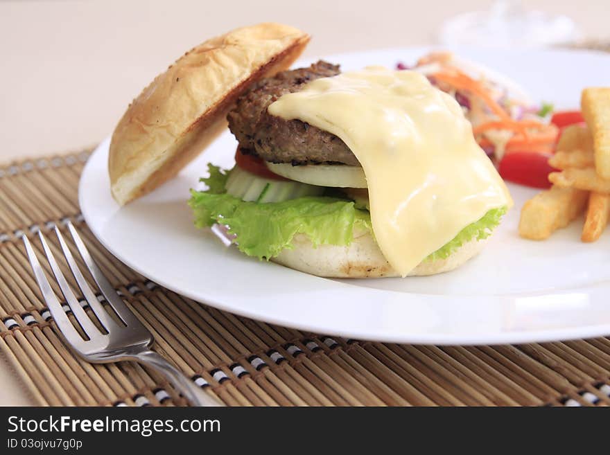 Cheese burger and french fried. Cheese burger and french fried