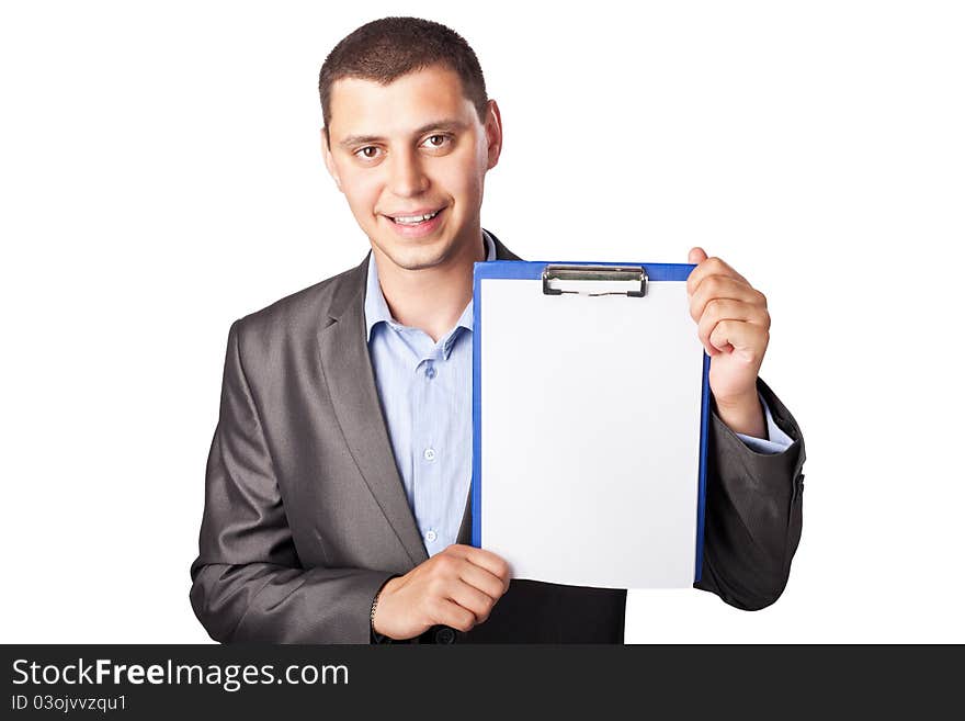 Smiling young businessman holding clipboard isolated on white background