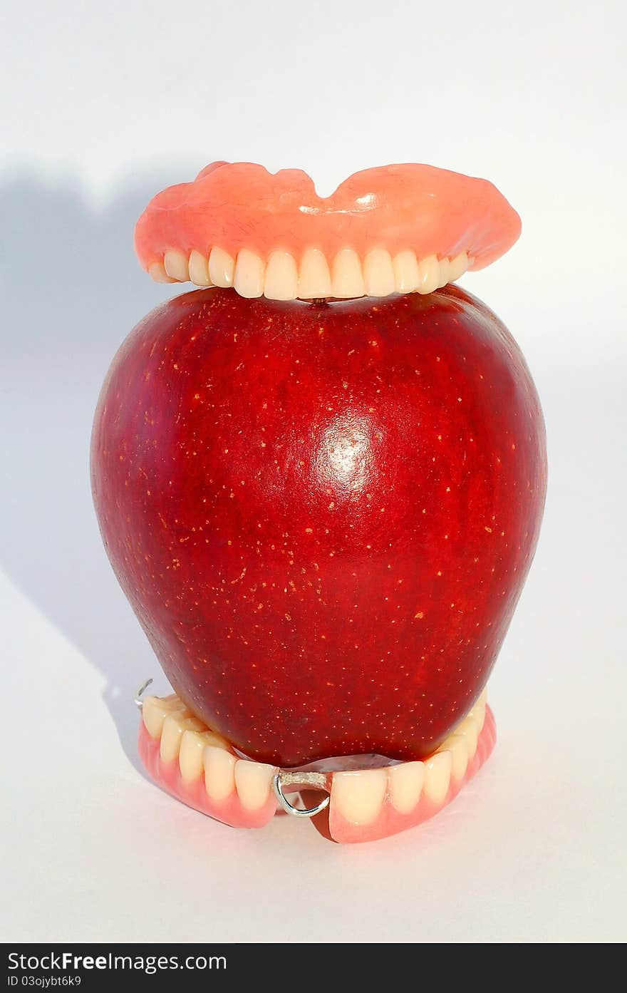 Dentures And Apple