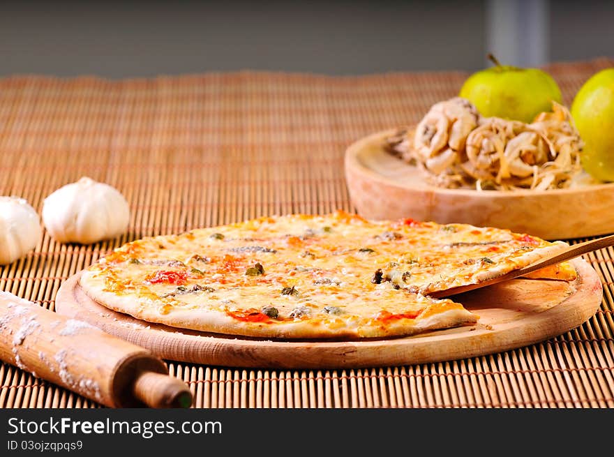 Italian pizza slice on table