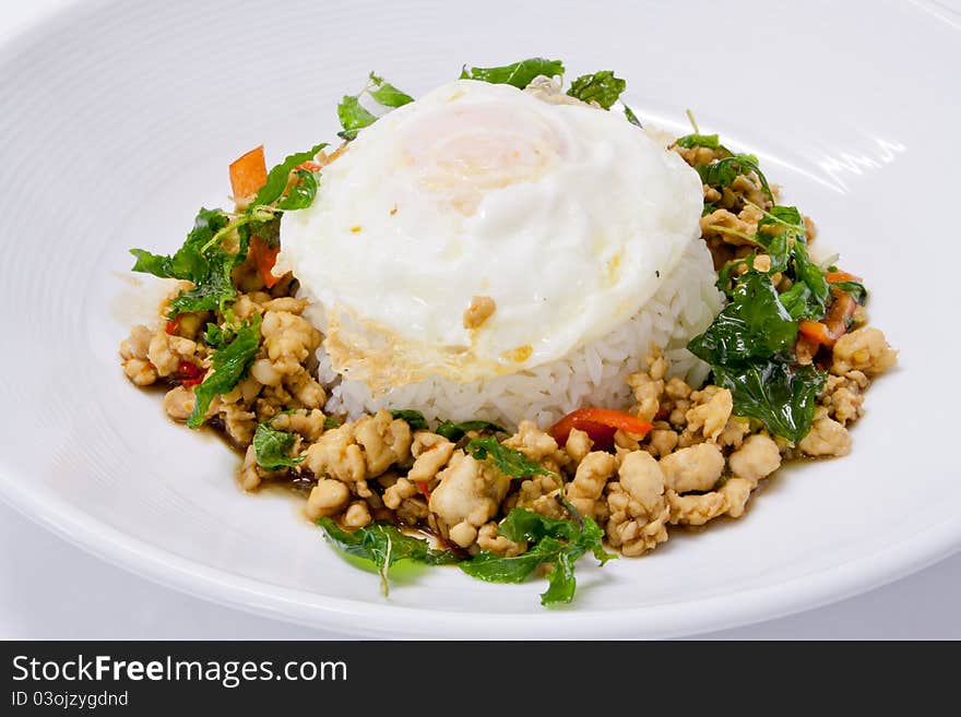 Chicken sauteed with garlic and hot basil