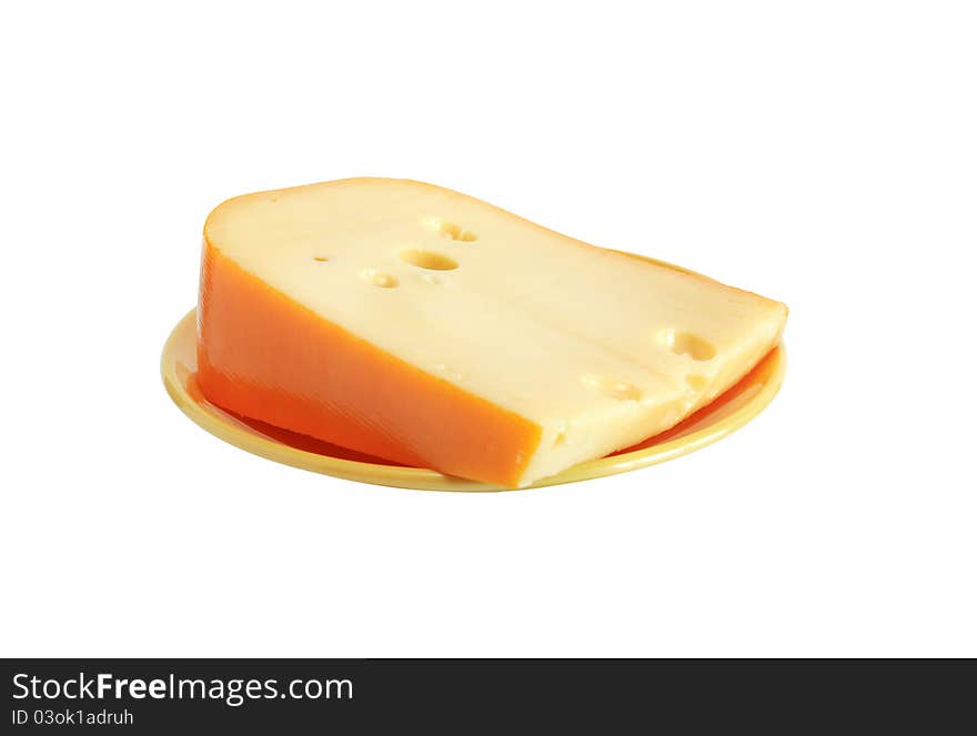 Piece of cheese on yellow plate. Isolated on white with clipping path. Piece of cheese on yellow plate. Isolated on white with clipping path