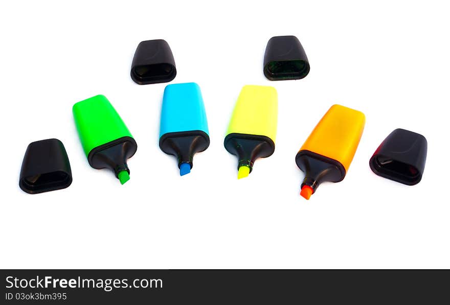 Colored markers isolated on a white background