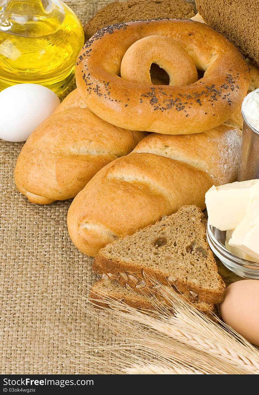 Bakery products and grain on sack burlap