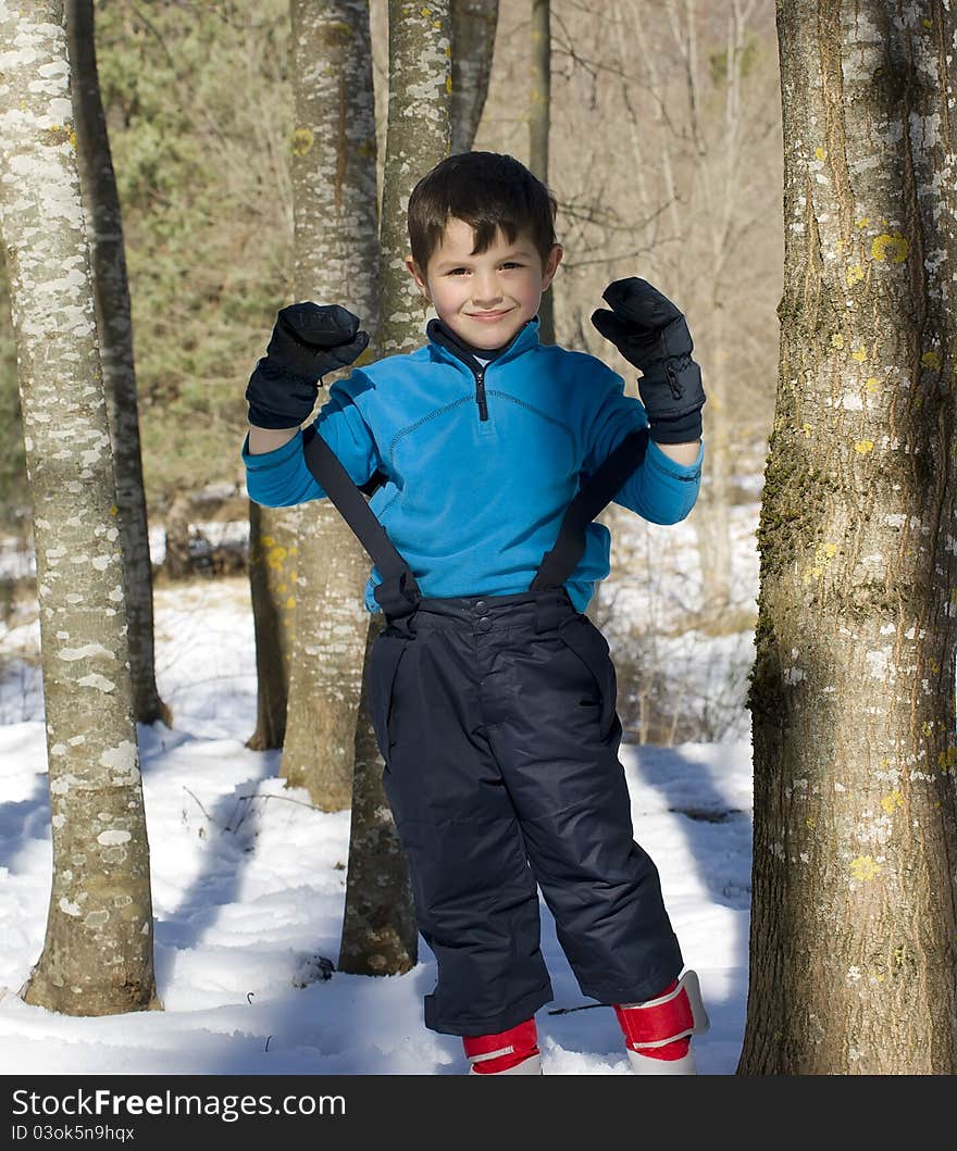 A lovely child posing on the snow. A lovely child posing on the snow