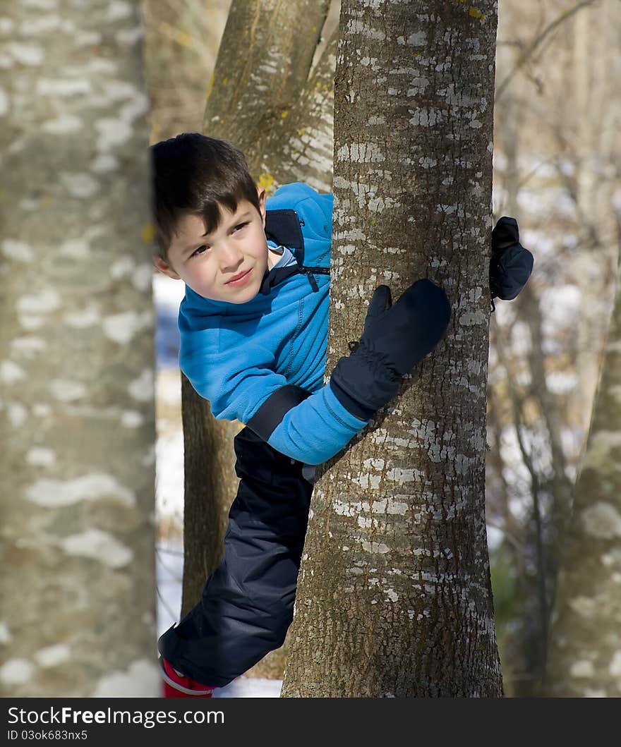 A lovely child posing on the snow. A lovely child posing on the snow