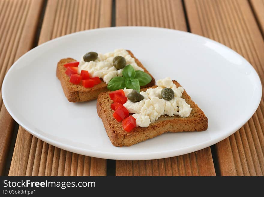 Toasts with cottage cheese and pepper