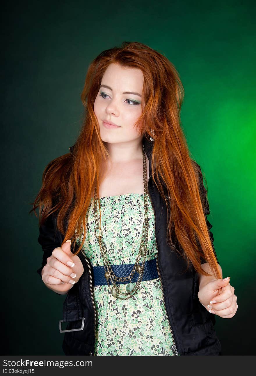 Studio shot of beautiful red haired woman