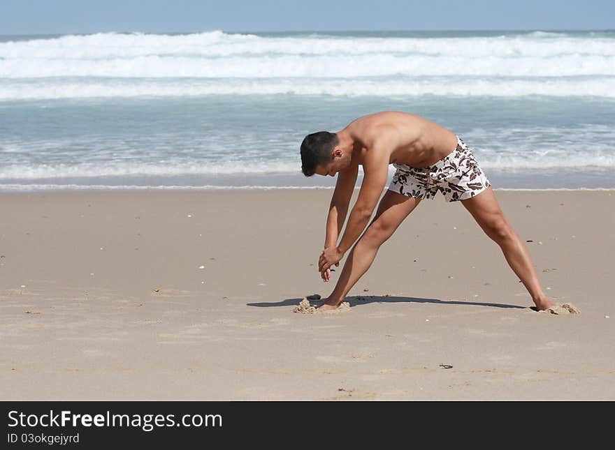 Attractive man making stretching