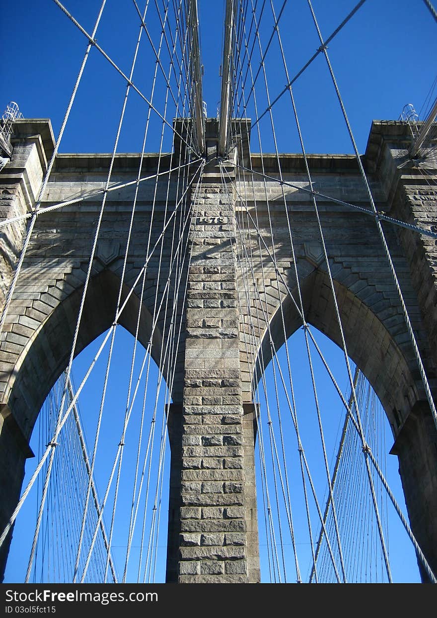 A close crop of the Brooklyn Bridge. One of New York's most famous landmarks and the crossing from Brooklyn to Manhattan over the East River.