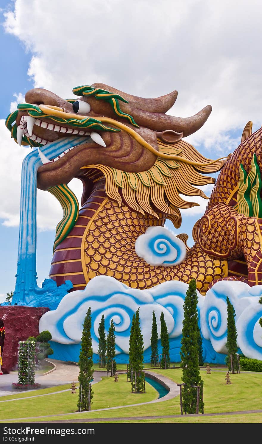 Golden dragon statue with blue sky vertical. Golden dragon statue with blue sky vertical