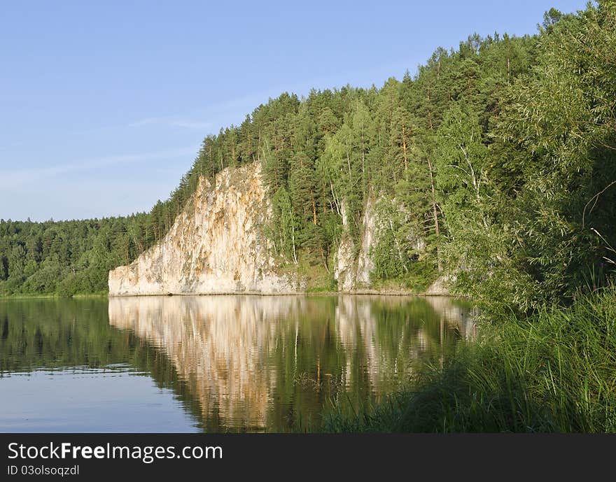 Mountain rock on Neiva river in Ural mountains. Mountain rock on Neiva river in Ural mountains.