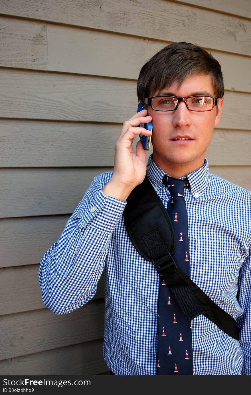 A young business man on the phone