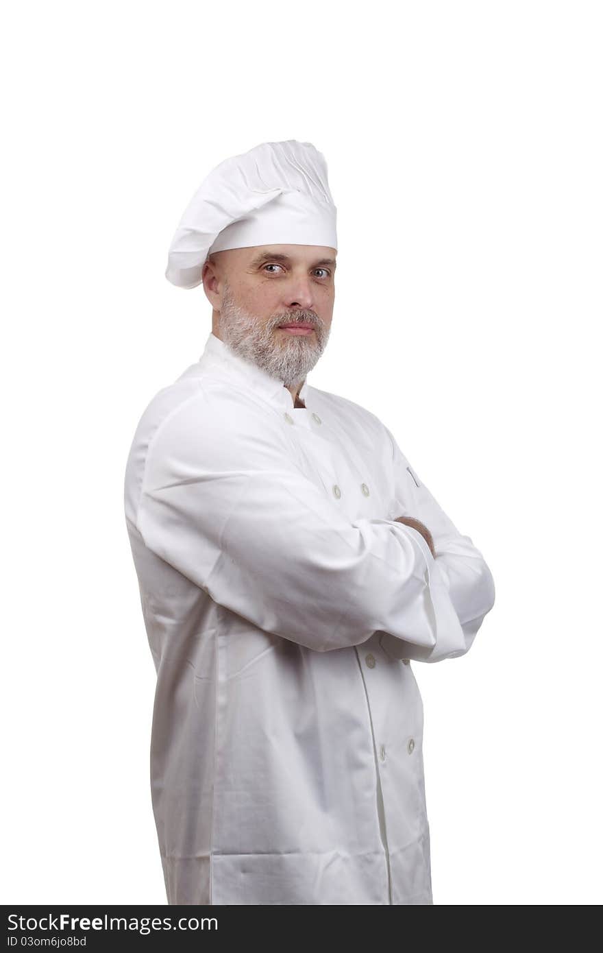 Portrait of a chef in a chef's hat and uniform isolated on a white background.