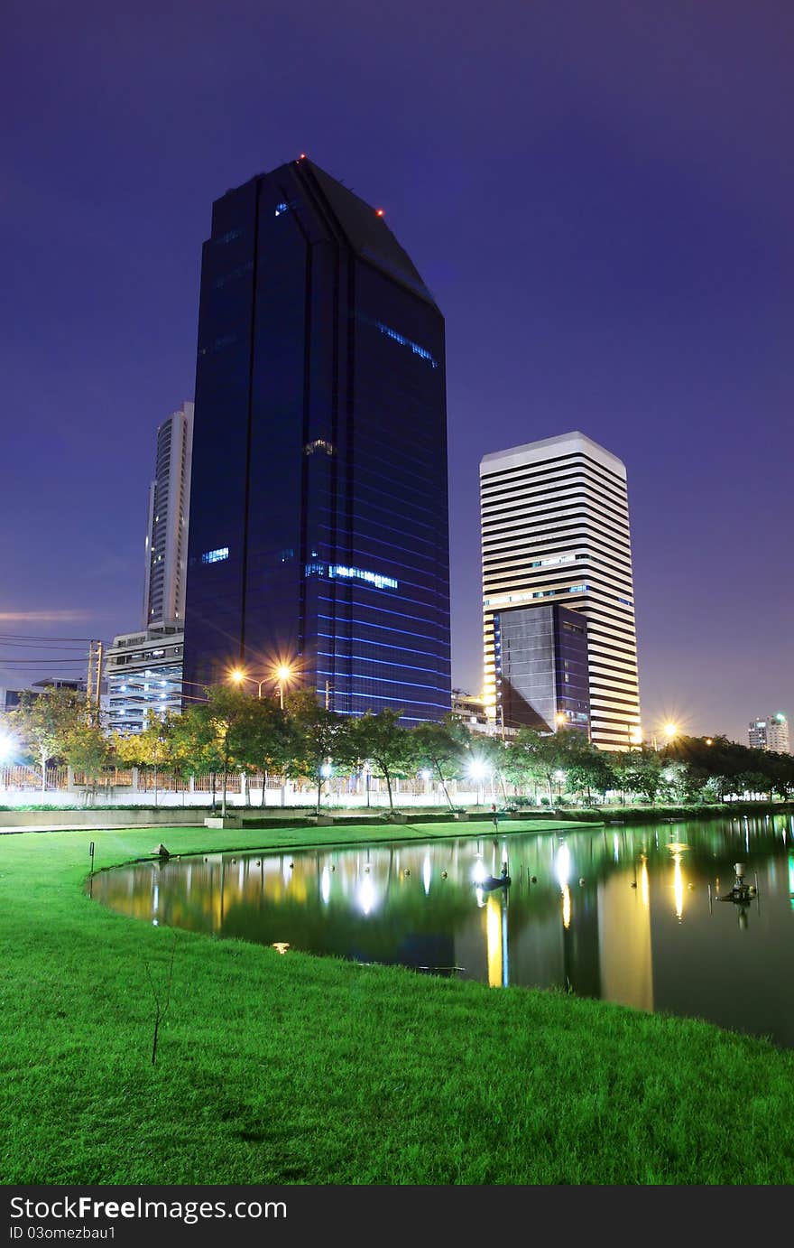 Modern buildings in the park at night of Bangkok, thailand. Photo taken on: August 13th, 2011