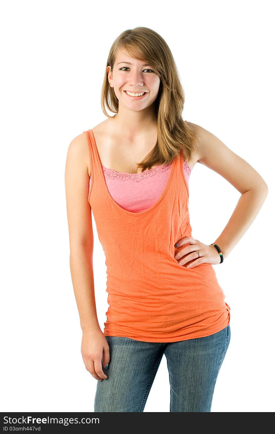 Seventeen year old girl poses wearing tank top with jeans. Seventeen year old girl poses wearing tank top with jeans.