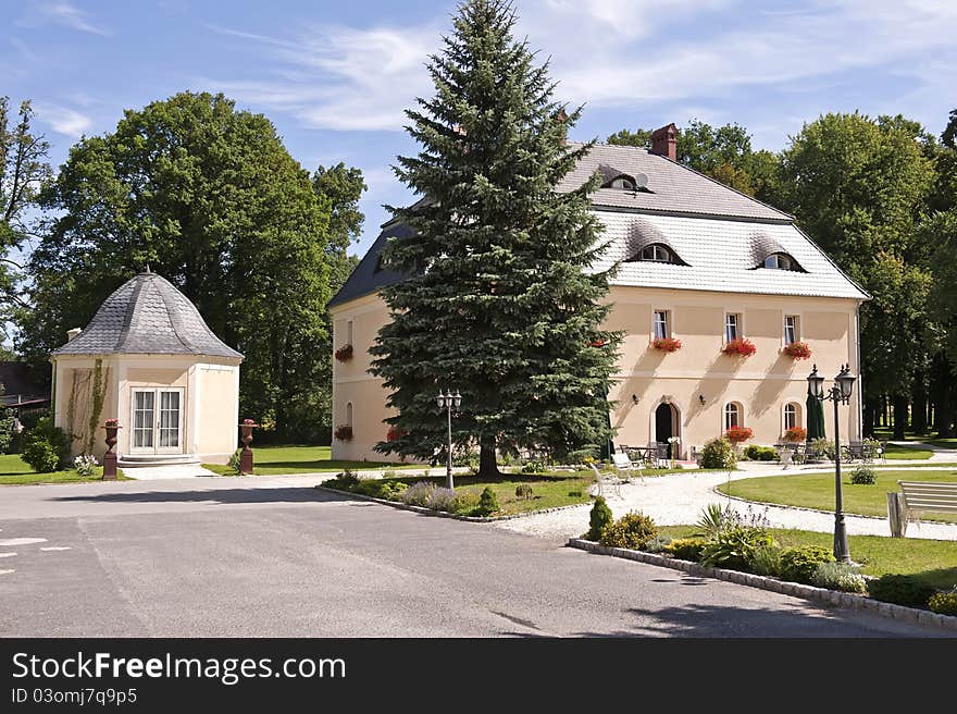 Road to the old mansion house on the countryside estate in Poland.