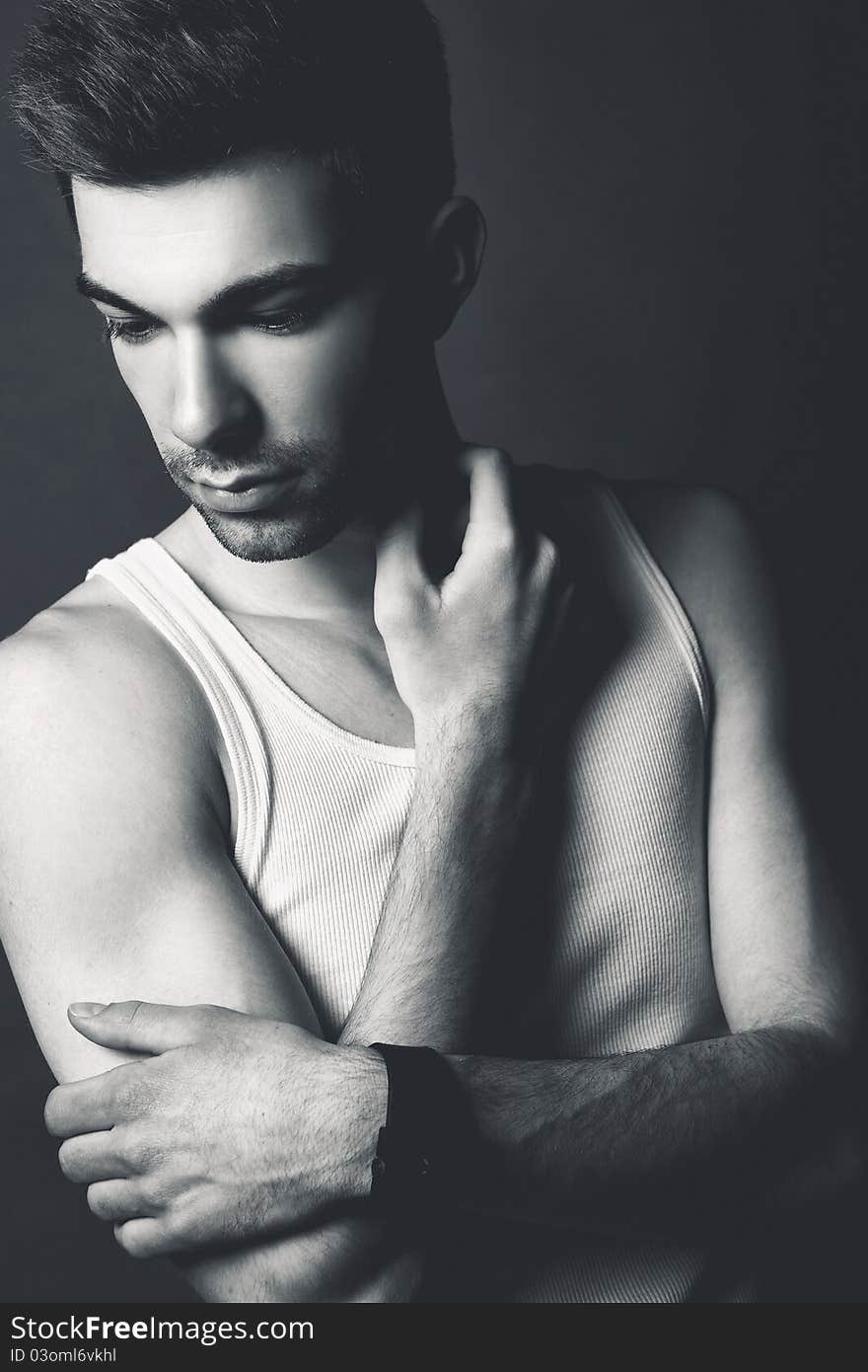 Black & White gamoures portrait about a handsome guy in a fashionalble shirt. Black & White gamoures portrait about a handsome guy in a fashionalble shirt