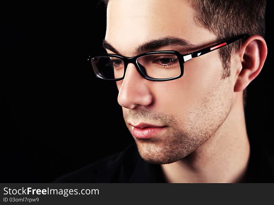 Young businessman in glasses