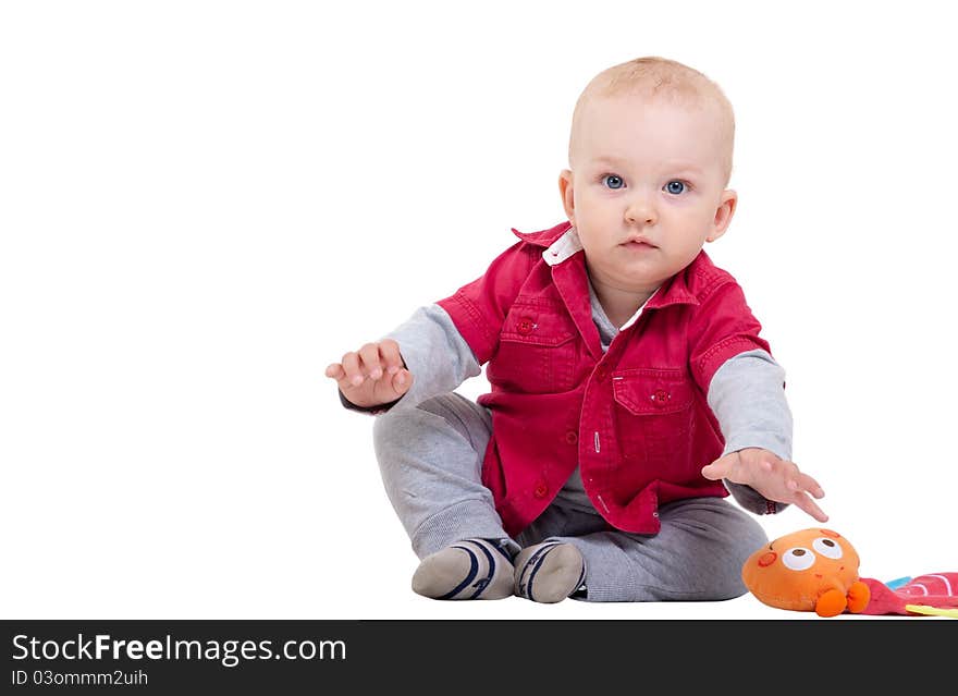 Funny little boy playing with toy