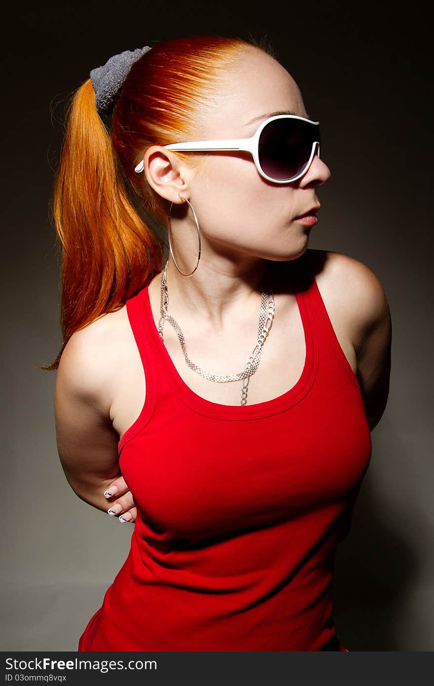 Young Hip-hop Girl Posing In Studio