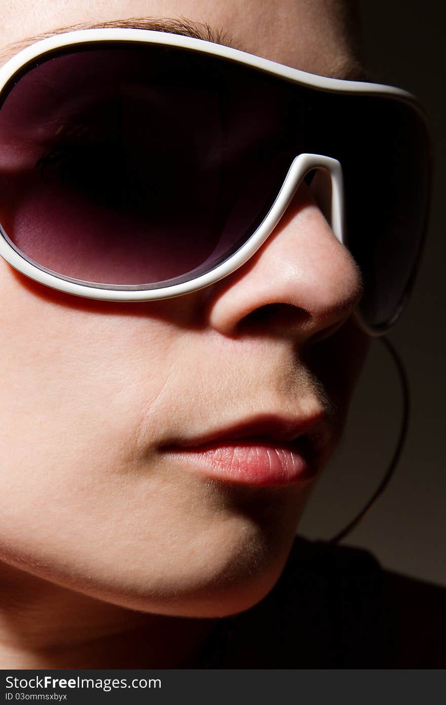 Portrait of young girl in sunglasses