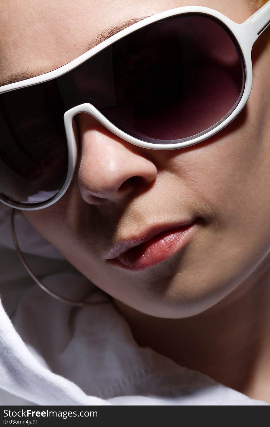 Portrait Of Young Girl In Sunglasses