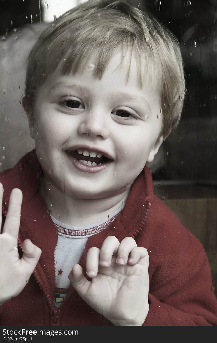 Child Staring Out The Window