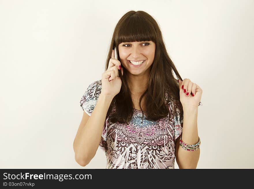 Young woman talking on the phone