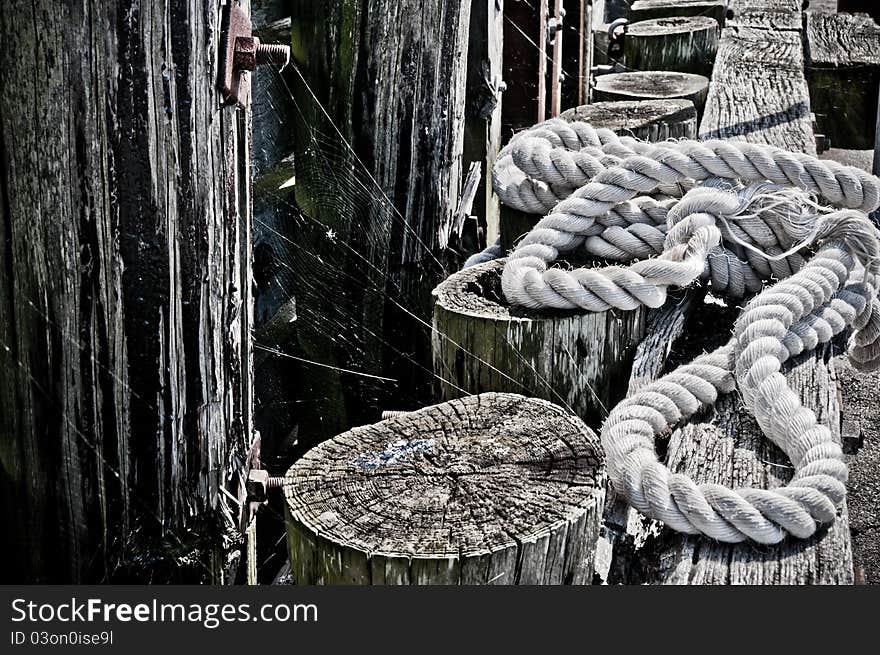 White rope laying in harbor environment. White rope laying in harbor environment