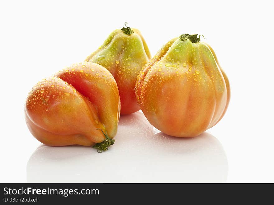 Tomatoes on a white background