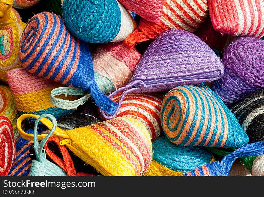 Colorful traditional Thai style basketwork purses made by sedge