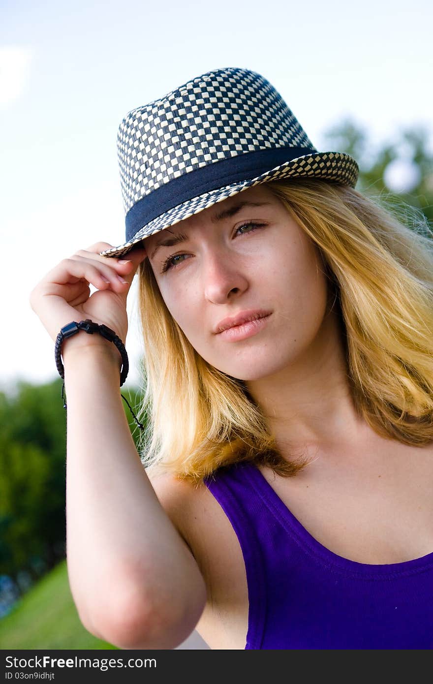 pretty girl in hat on outdoor