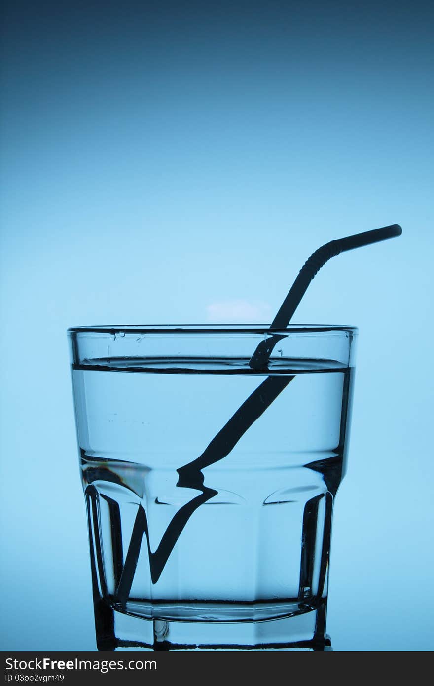 A glass cup with white background.