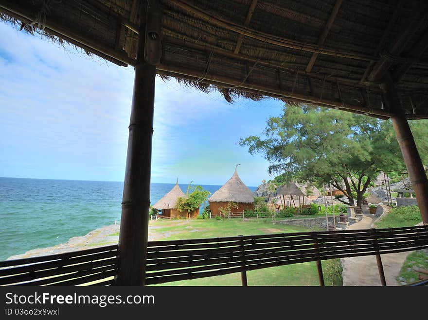 The view form inside hut at bay in thailand island