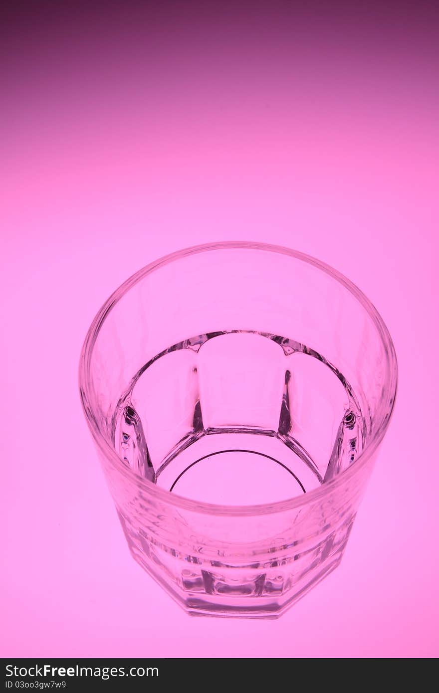 A glass cup with white background.