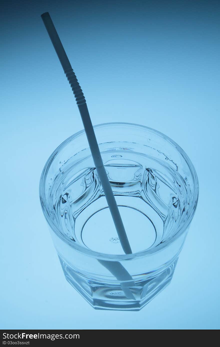 A glass cup with white background.