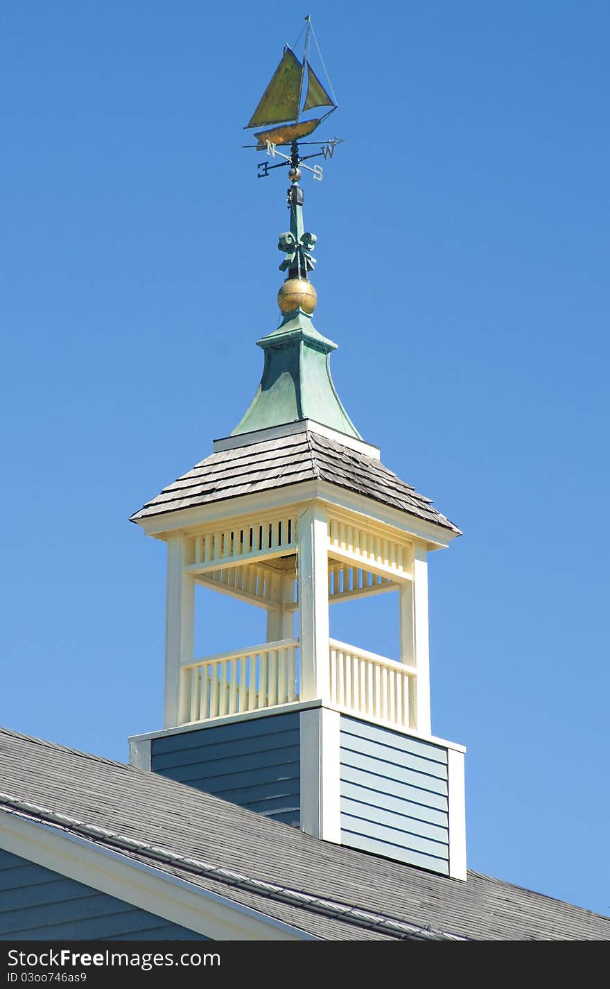 Weathervane in the form of a sailing ship on a roof cupola