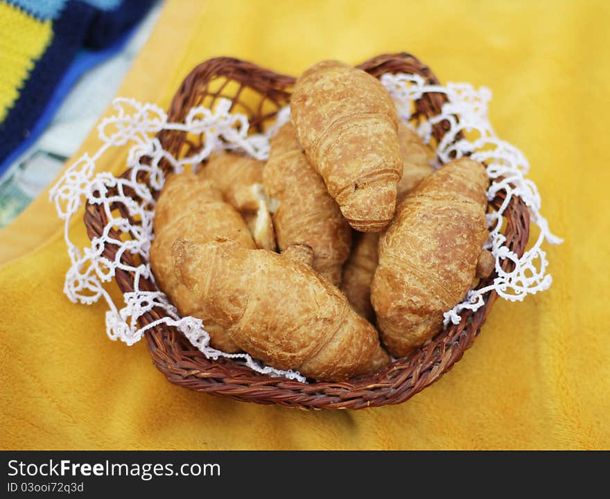 Croissants in a wicker tray