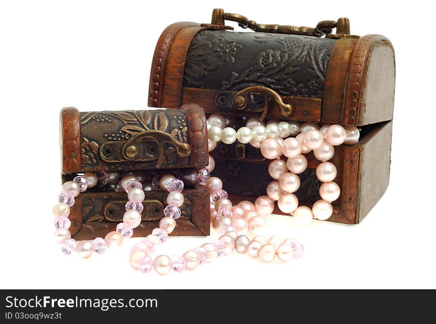 Two wooden chest with pearl necklace , isolated on white. Two wooden chest with pearl necklace , isolated on white