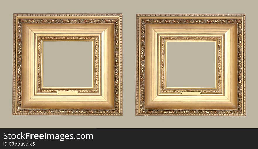 Two ancient gold frame on a grey background