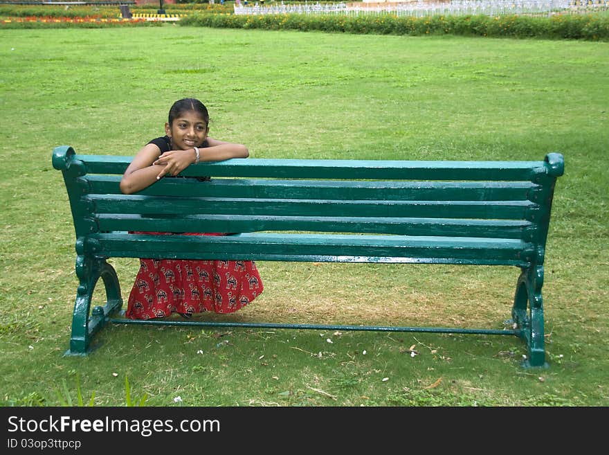 Girl On A Garden Bench