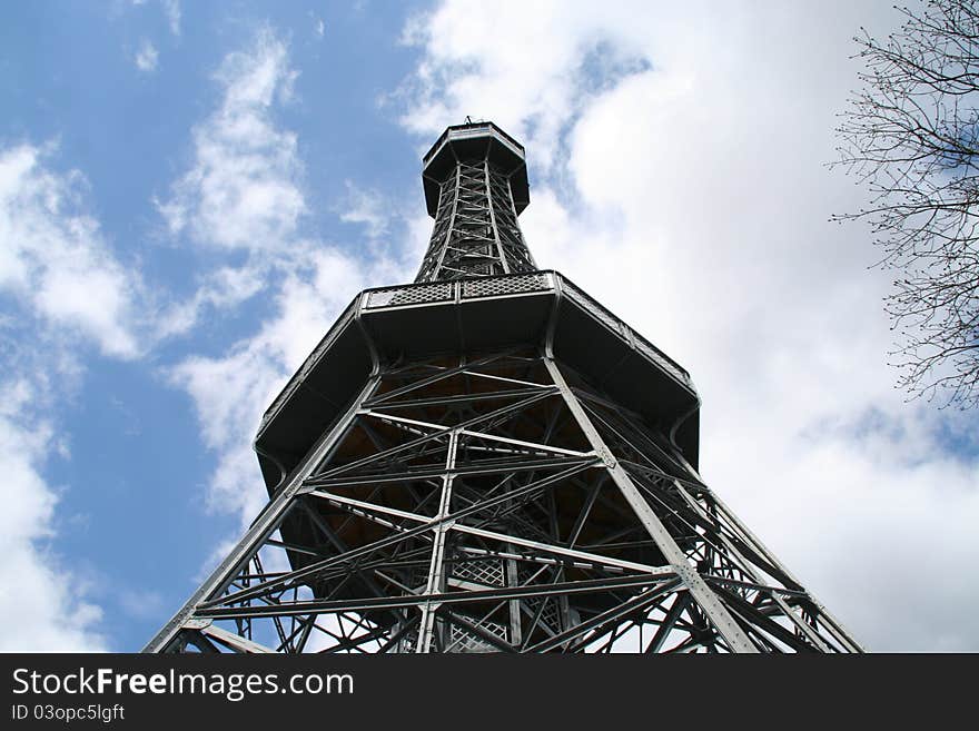 The Petřín Lookout Tower is a 60 metre high steel framework tower in Prague, which strongly resembles the Eiffel Tower. Although it is much shorter than the Eiffel Tower, it stands atop a sizable hill, Petřín, so the top is actually at a higher altitude than that of the Eiffel Tower.