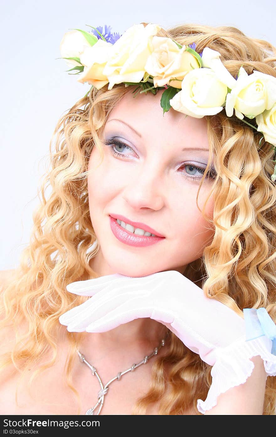 Bride posing in a studio on the wedding day. Bride posing in a studio on the wedding day