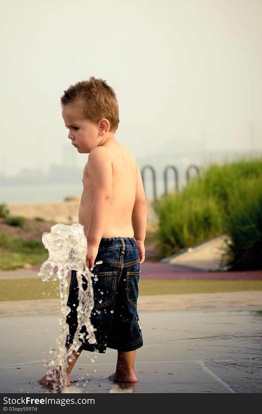 Boy playing in water