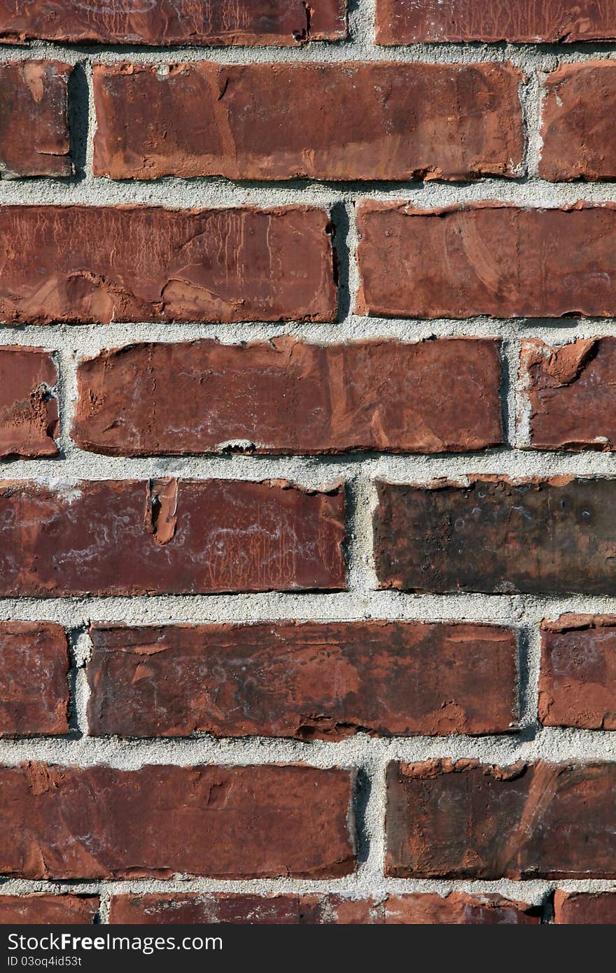 Heavy rustic brick wall in the sun. Heavy rustic brick wall in the sun.